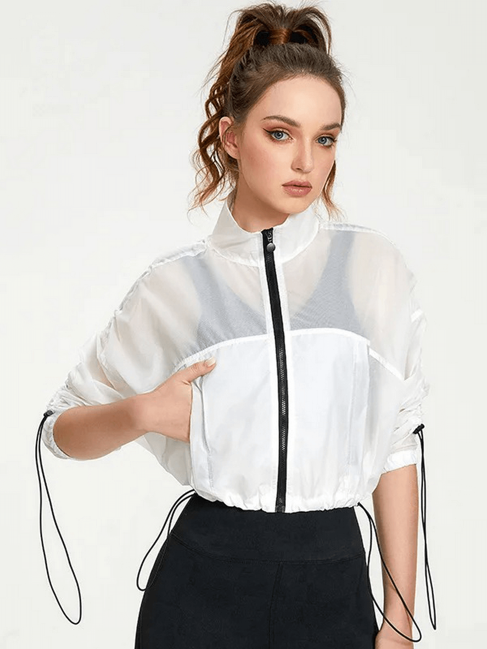 Model wearing a stylish women's neon windbreaker jacket with full sleeves, highlighting its breathable and windproof features.