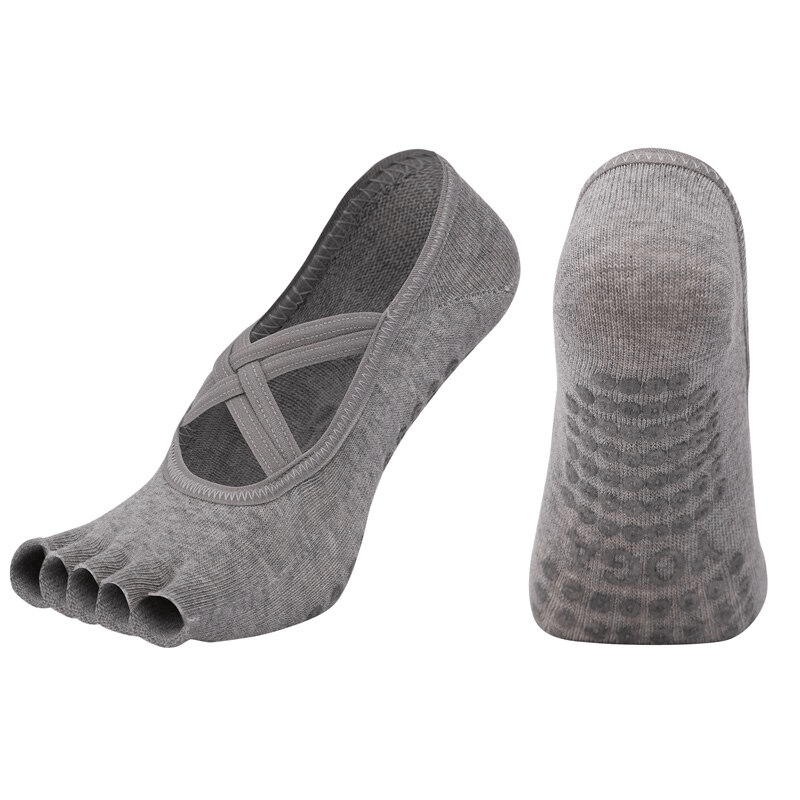 Gray women's non-slip breathable five-toe yoga socks with bandage design, perfect for comfort and flexibility in yoga practice.