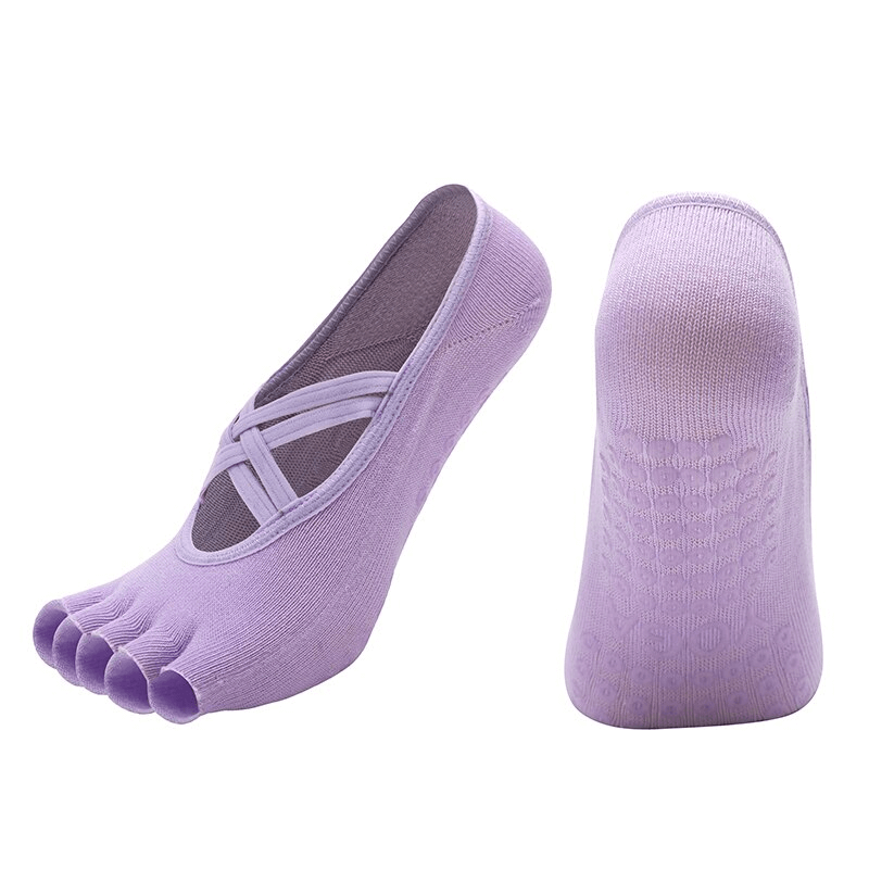 Purple women's non-slip breathable five-toe yoga socks with bandage design, showcasing flexibility and comfort for yoga practices.