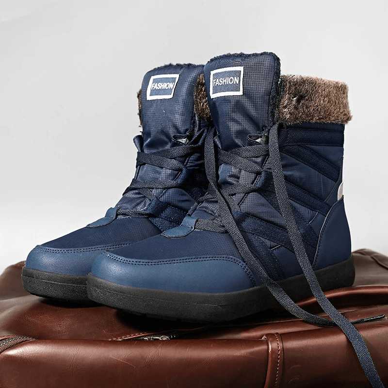 Women's non-slip insulated waterproof hiking boots SF1882 with blue microfiber upper on a brown surface.