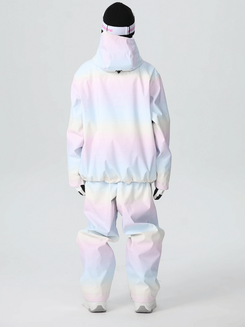 Back view of a women's pastel snowboard outfit featuring a jacket and pants, ideal for fashionable skiing or snowboarding.