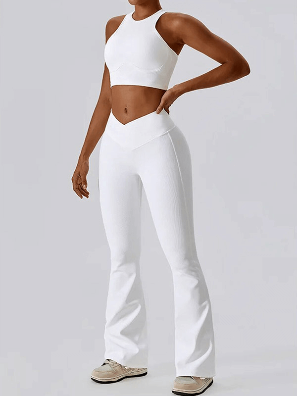 Model wearing white women's push-up sports bra and ribbed cross leggings SF1722, ideal for active, stylish comfort.