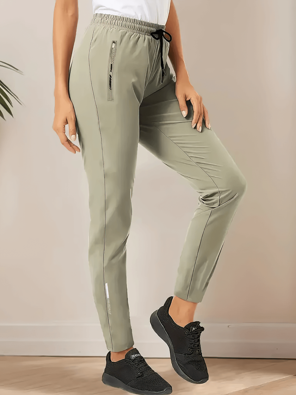 Alt Tag: Women's Quick-Dry Ankle Pants with Zip Pockets - SF4404 in sage green, tapered jogger fit with drawstring waist and zip pockets