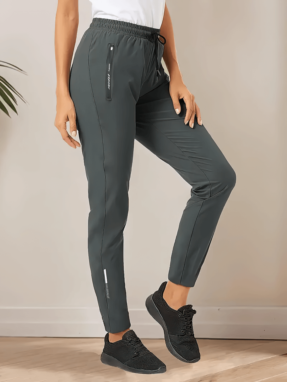 Alt Tag: Women's Quick-Dry Ankle Pants with Zip Pockets - SF4404 dark gray jogger ankle pants with zip pockets and drawstring waist