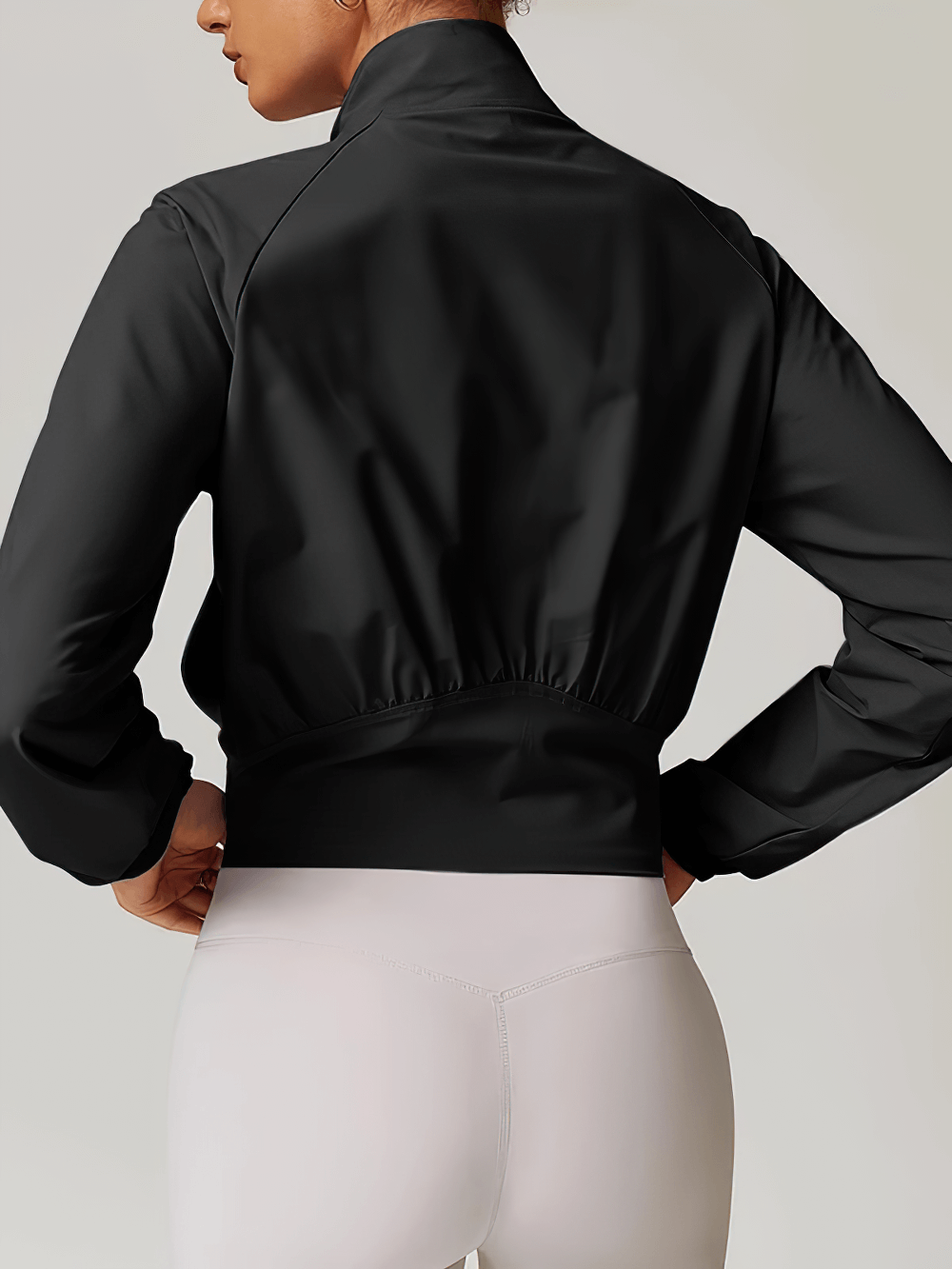 Back view of Women's Quick-Dry Running Windproof Zip Jacket - SF4083, featuring a sleek nylon design and stand collar for sporty style.