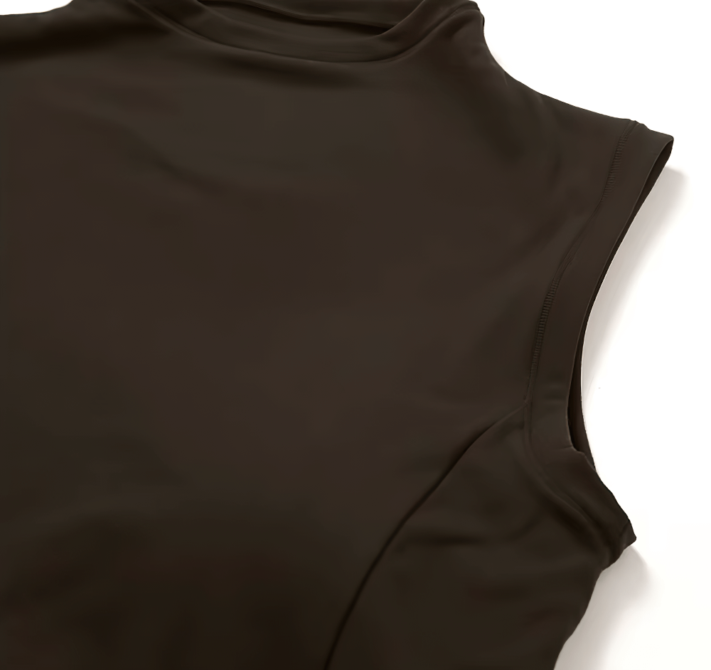 Women's quick-dry sleeveless tank for running, high impact sports top in dark color, breathable and flexible for active wear.