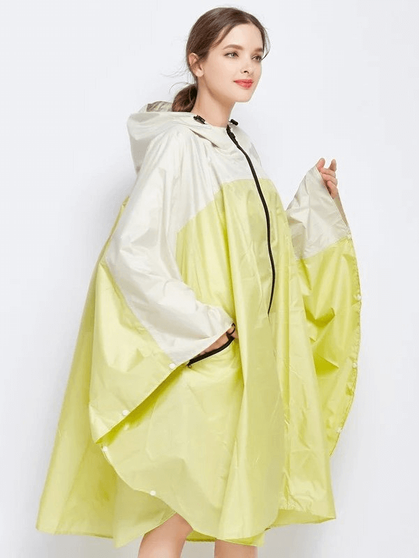 Women's raincoat-poncho with zipper and hood, in waterproof polyester, lime-green color, perfect for rainy days - SF1982