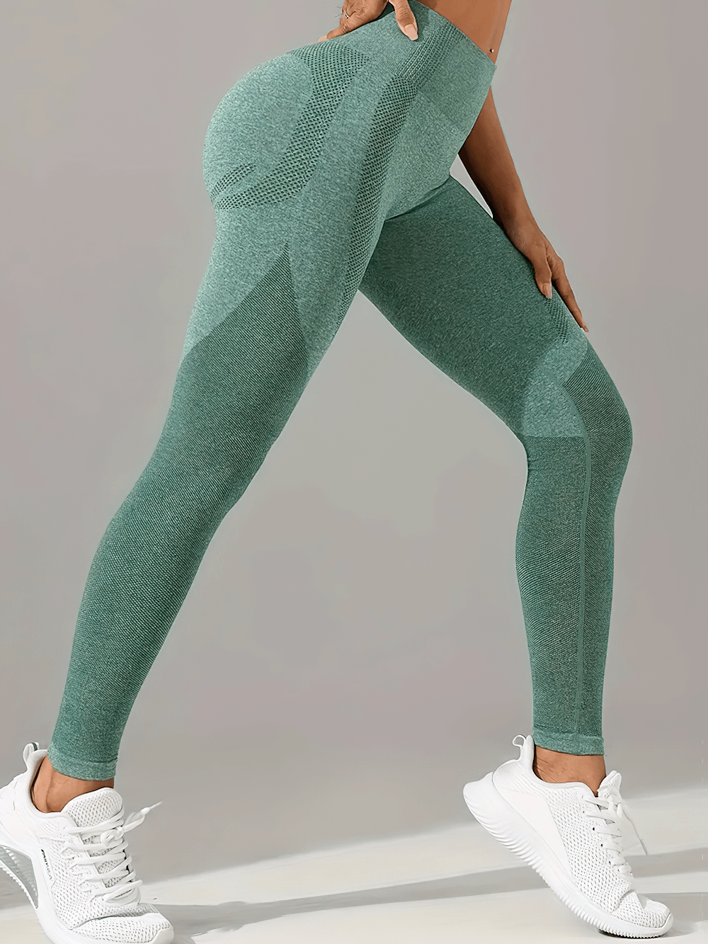 Model showcasing Women's Seamless Booty Lift Gym Leggings - SF4059 in action, highlighting contour fit and high waist style.