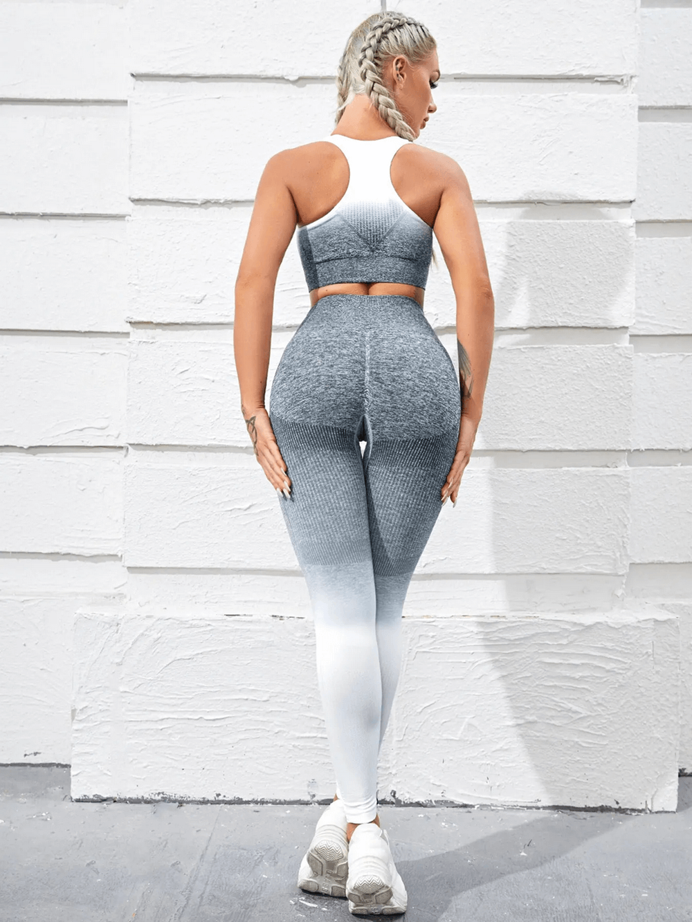 Alt Tag: Women's Seamless Ombre Gym Yoga Set with Leggings - SF4312 model in grey-to-white ombre sports bra and high-waist leggings, back view