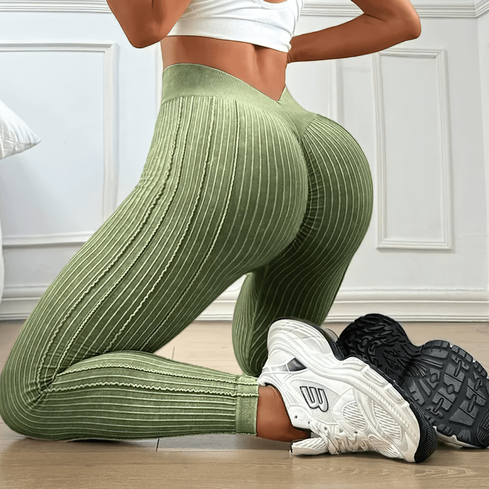Women's Seamless Ribbed High Waist Gym Leggings - SF4011 in green, showcasing hip lifting fit and solid striped rib knit texture.