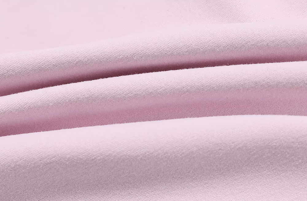 Close-up of pink nylon spandex fabric for Women's Seamless Yoga T-Shirt SF2416, highlighting breathable and lightweight material.