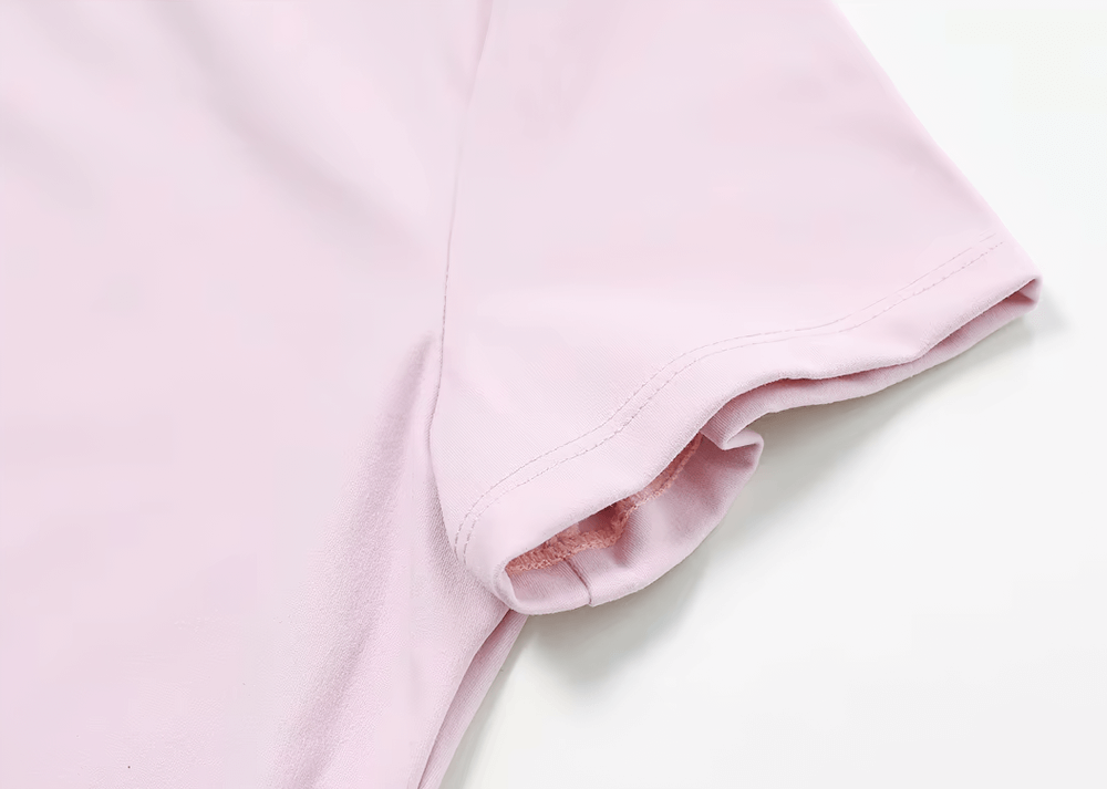 Close-up of Women's Seamless Short-Sleeve Yoga T-Shirt in soft pink showing lightweight, anti-pilling fabric ideal for workouts.