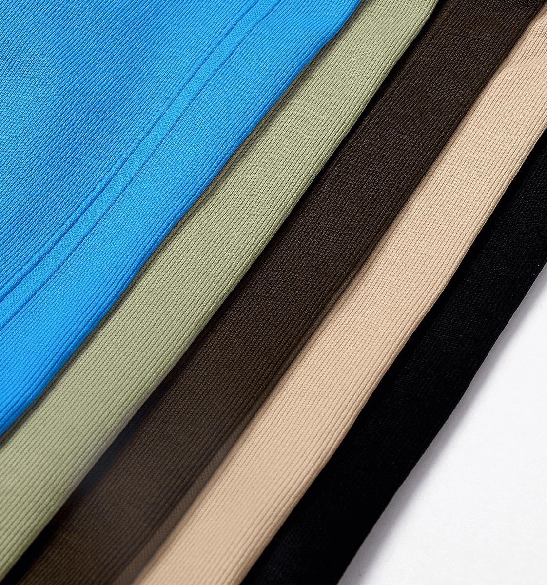 Close-up of fabric swatches in blue, olive, brown, beige, and black, showcasing texture and color variety for fashion design.