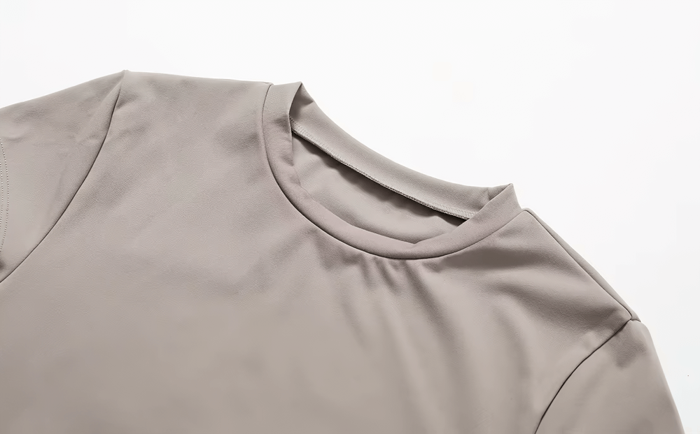 Women's short sleeve fitness t-shirt, SF2417, in beige. Perfect for yoga, running, and hiking. Breathable, quick-dry fabric.