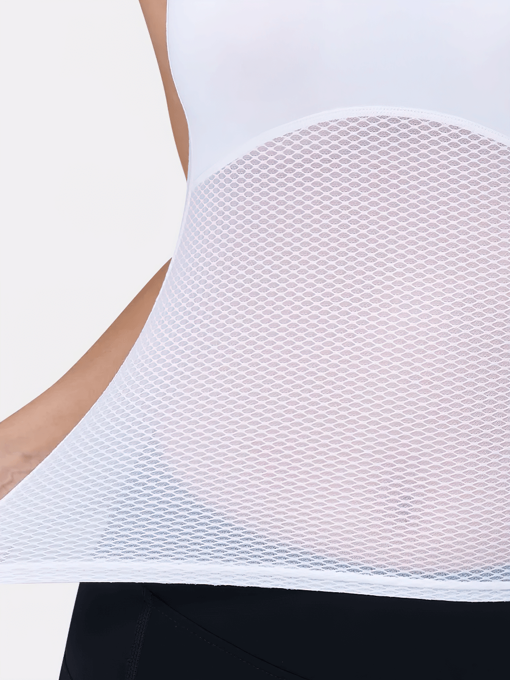 Close-up of women's sleeveless mesh cycling base layer top, showcasing breathable lightweight mesh fabric for enhanced comfort.