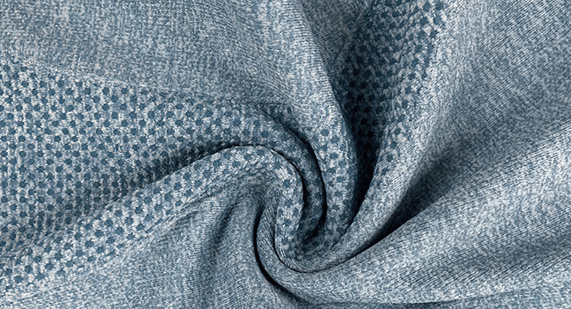 Close-up of breathable, quick-dry fabric with a textured pattern, ideal for women's sports hoodie with thumb holes.