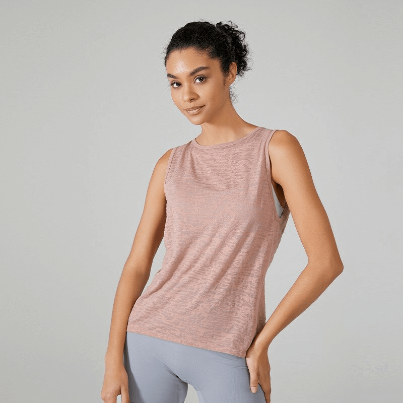 Model wearing women's sporty lightweight tank top with cut on back, perfect for fitness, breathable cotton blend. SF1543.