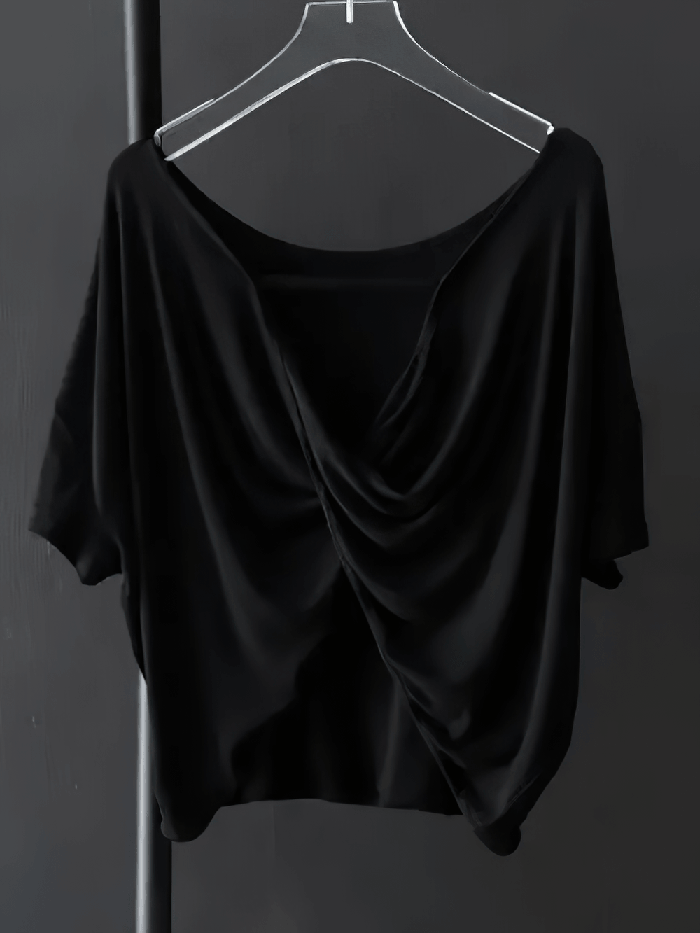 Alt Tag: Women's Sporty O-Neck Loose Asymmetrical T-Shirt - SF4454 black draped asymmetrical loose tee on hanger, short sleeves