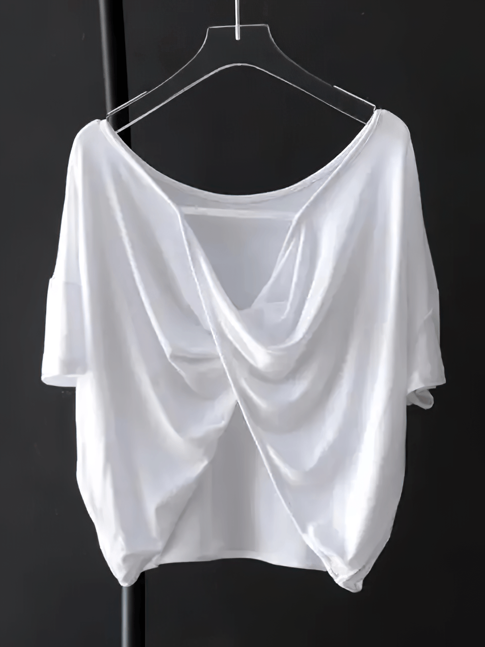 Alt Tag: Women's Sporty O-Neck Loose Asymmetrical T-Shirt - SF4454 white draped asymmetrical short sleeve O-neck loose fit top on hanger