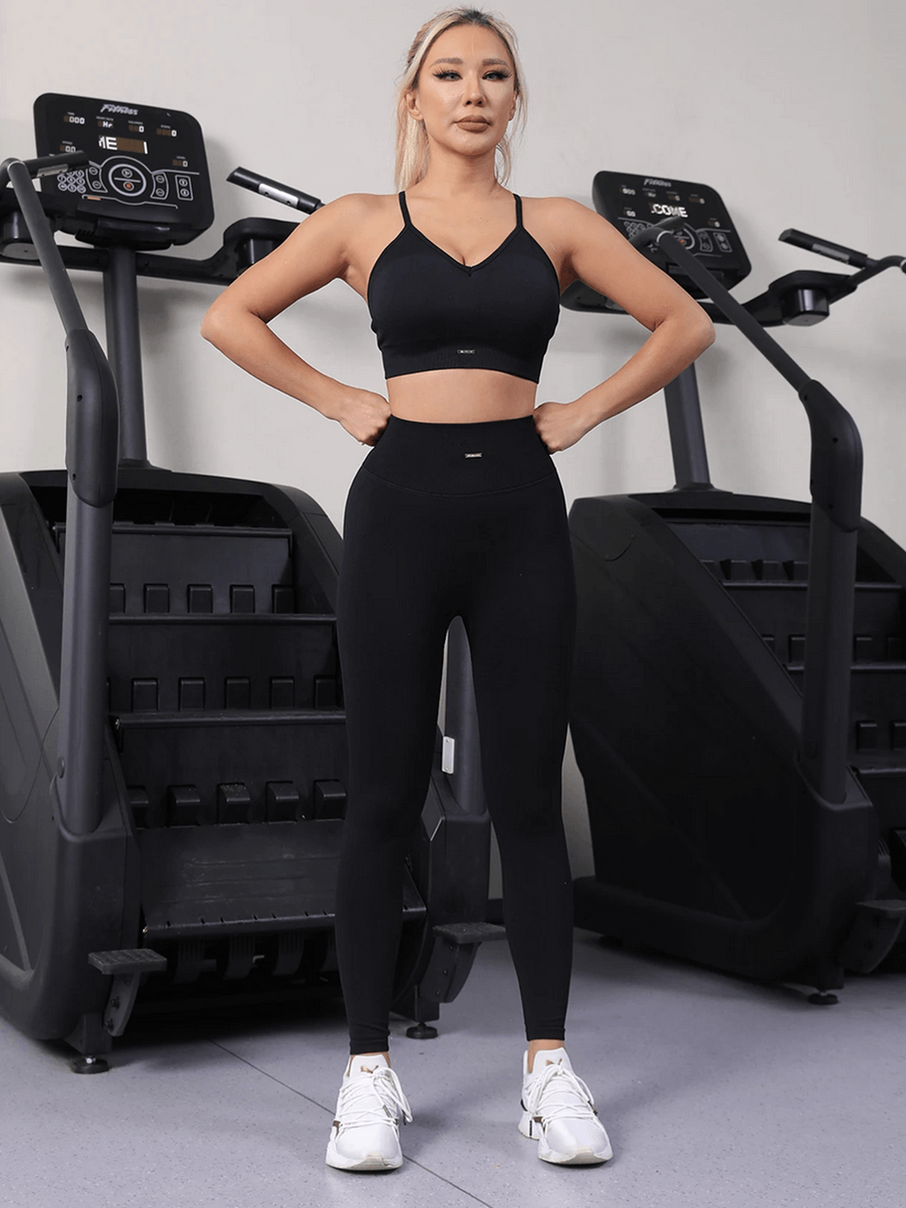 Alt Tag: Women's Strappy Back Yoga Set and Sculpt Leggings - SF4315 shockproof sports bra & high-waist sculpt leggings in gym