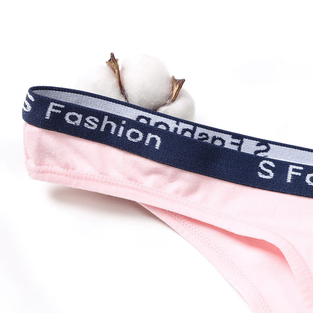 Women's stretch cotton thong with fashionable elastic waistband, soft pink color, showcased with cotton flower, model SF2527.