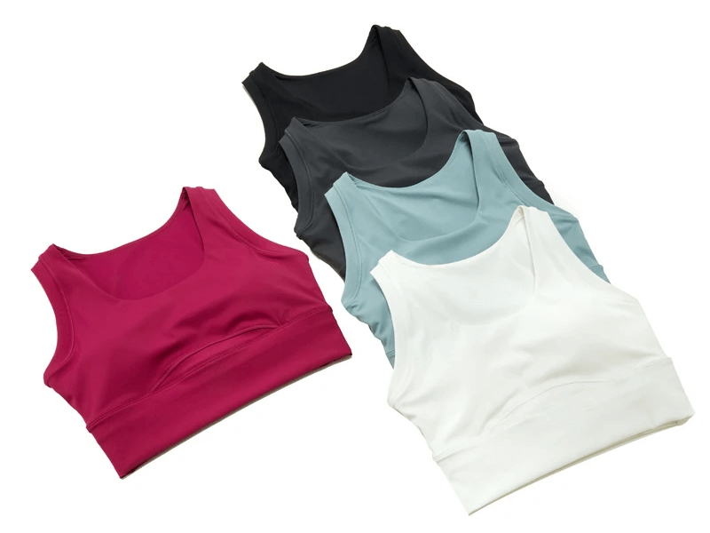 Colorful women's sports bras in pink, black, gray, blue, and white for versatility and style.