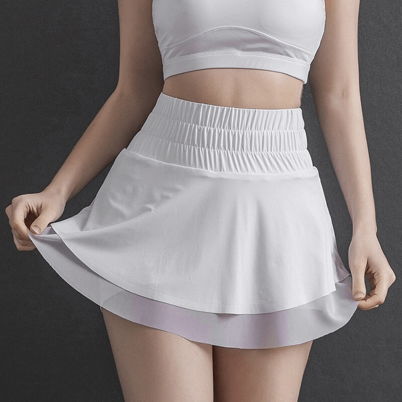 Women's tennis high waist skirt with hidden pockets, breathable and stretchy fabric, perfect for sports and fitness activities.