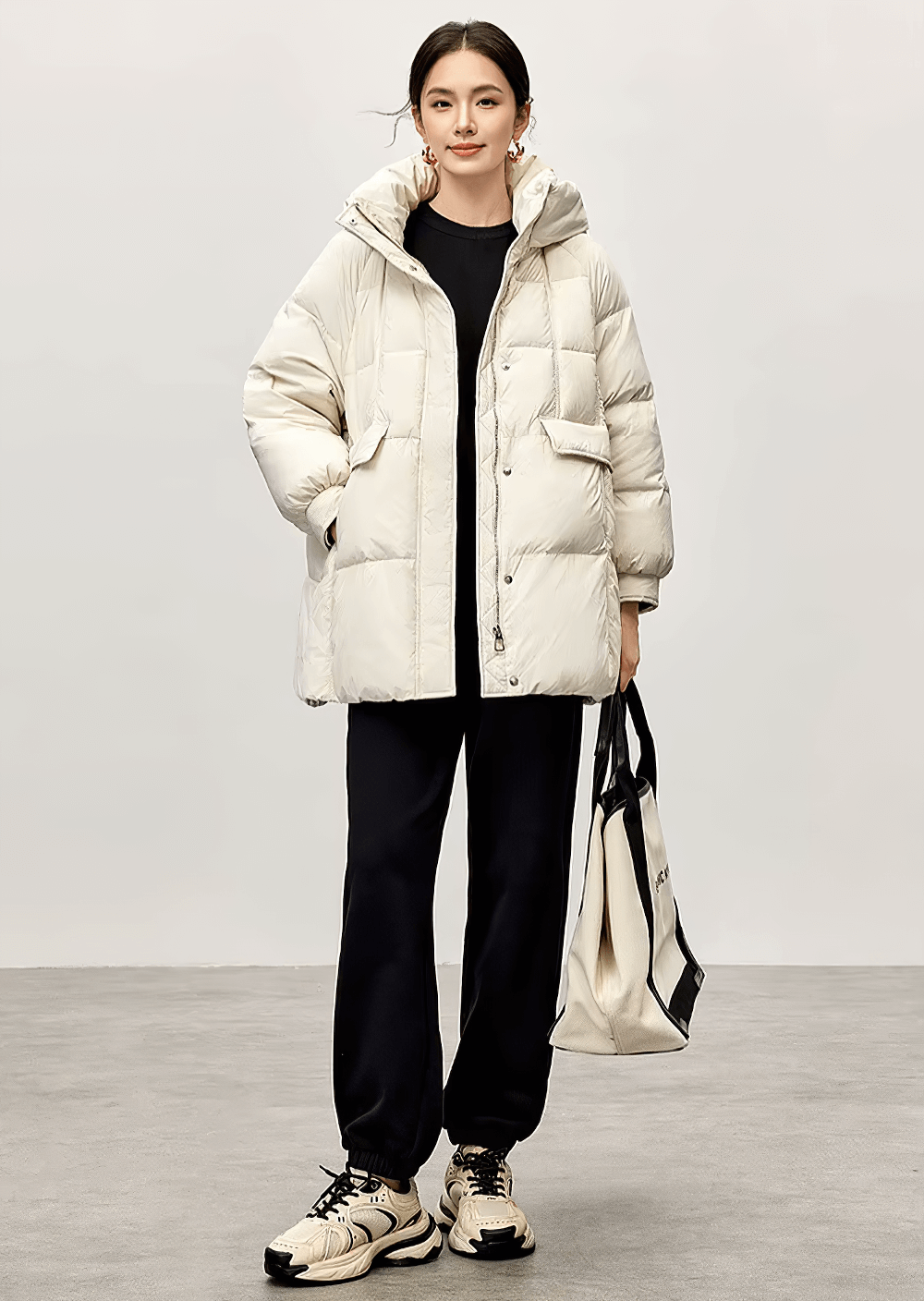 Women's thick warm hooded puffer jacket with stand neck, white duck down fill, and zipper closure for winter.