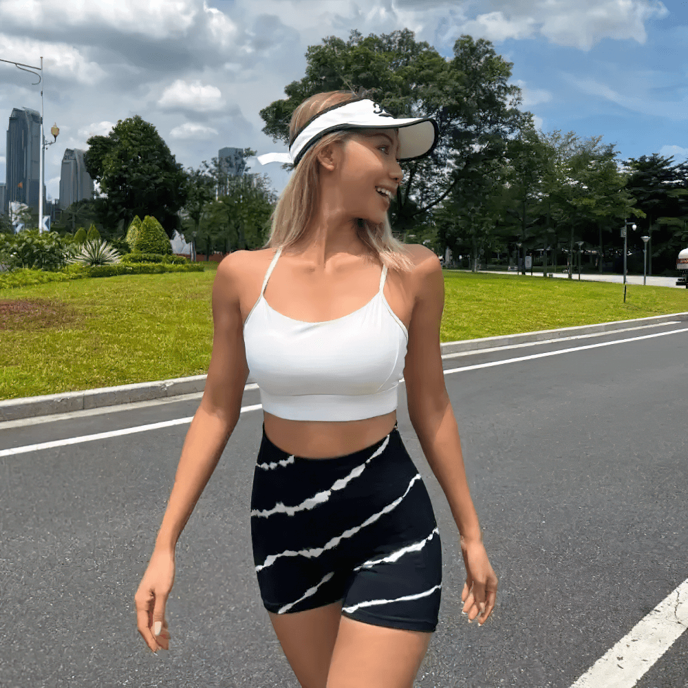 Woman wearing Women's Tie-Dye High Waist Peach Lift Shorts - SF4127 for outdoor sports activity