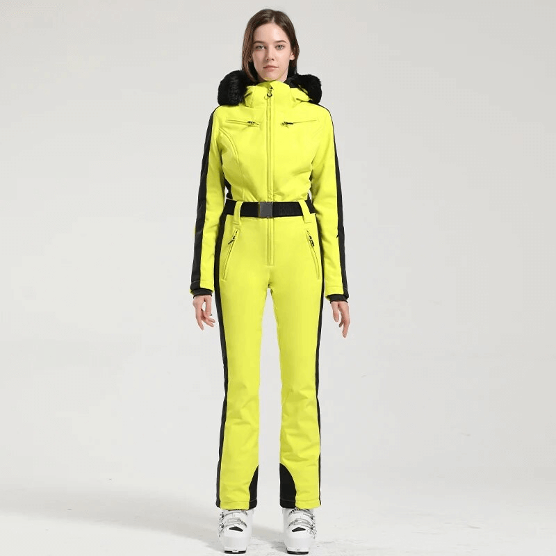 Women's neon yellow one-piece ski suit with hood, designed for warmth and protection, featuring durable materials and windproof technology.