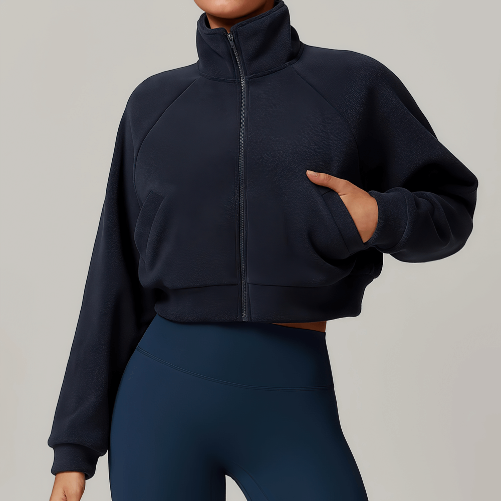 Women's windproof winter yoga jacket with zipper, full-length sleeves, and slit pockets - perfect for outdoor fitness and adventures.