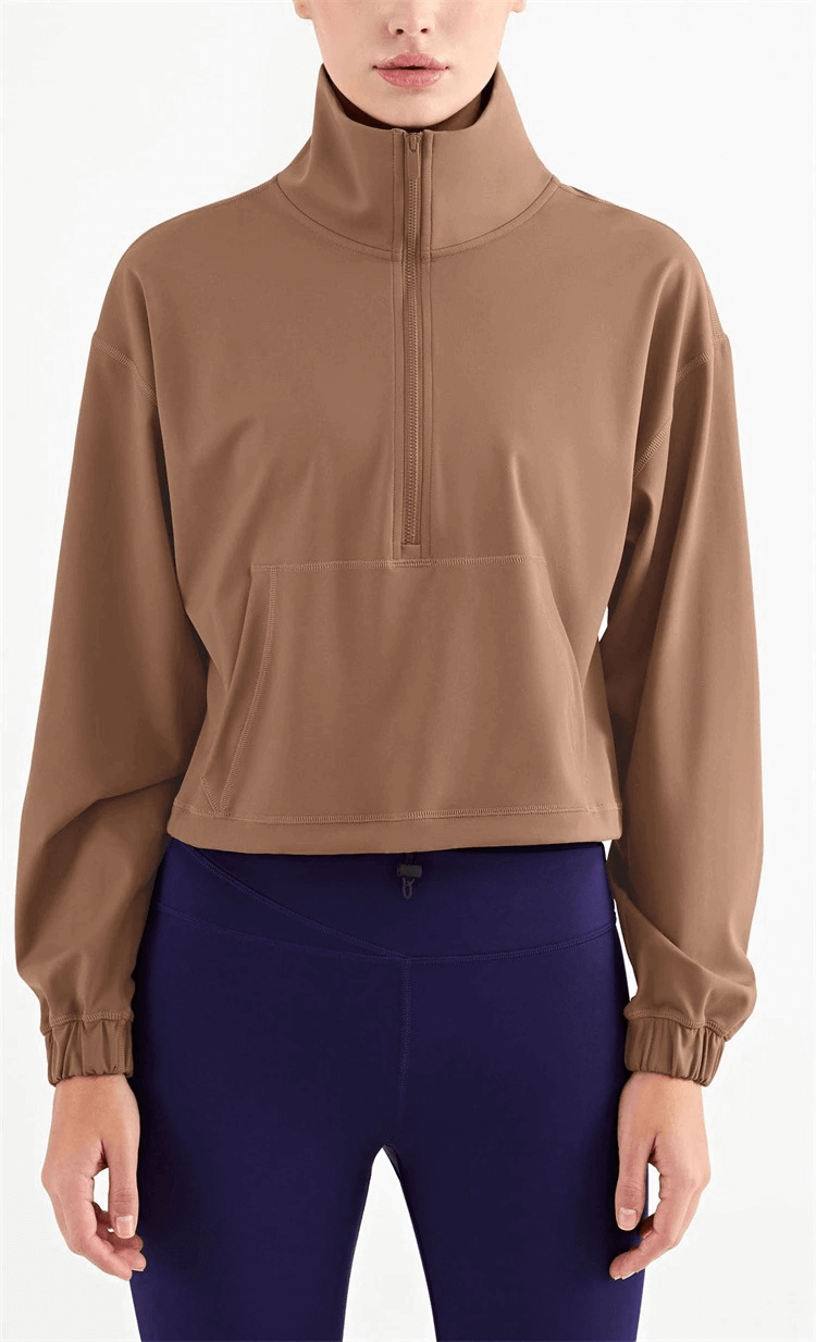Women's workout sports sweatshirt with pocket, v-neck collar, and relaxed fit for comfort and convenience in brown.