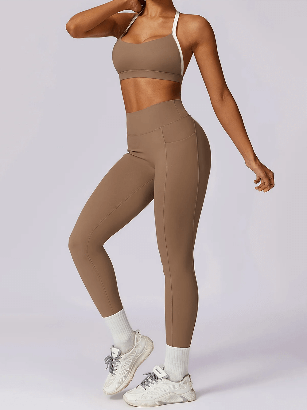 Alt Tag: Women's yoga set sleeveless top and leggings, perfect for fitness, crafted from breathable, quick-dry nylon-spandex blend.