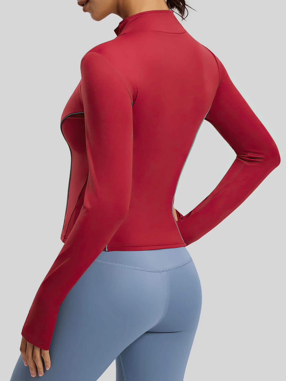 Side view of Women's Zip Up Running Jacket with Thumb Holes - SF4084 in red, showcasing full-zip design and long sleeves with thumbhole cuffs.
