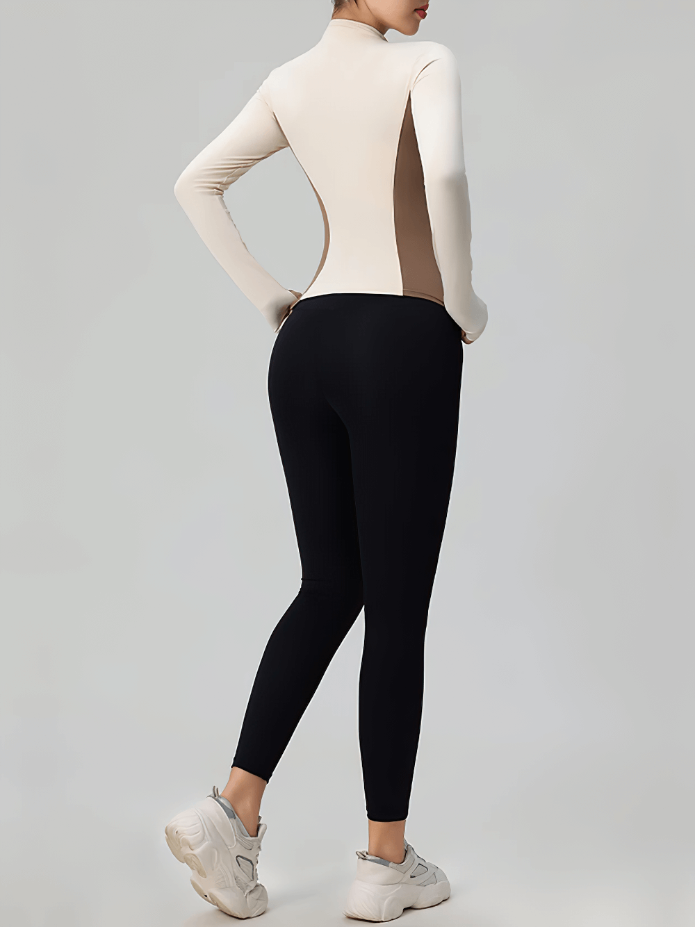 Back view of Women's Zip-Up Turtleneck Yoga Jacket with Thumbholes - SF4050, featuring sleek design and finger hole sleeves.