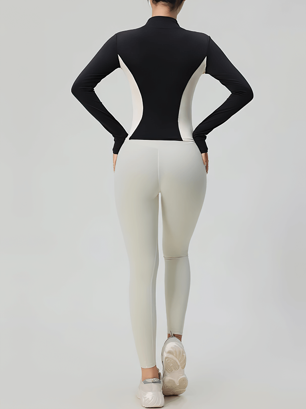 Back view women's zip-up turtleneck yoga jacket with thumbholes SF4050, sleek design with long sleeves and finger holes, sportswear