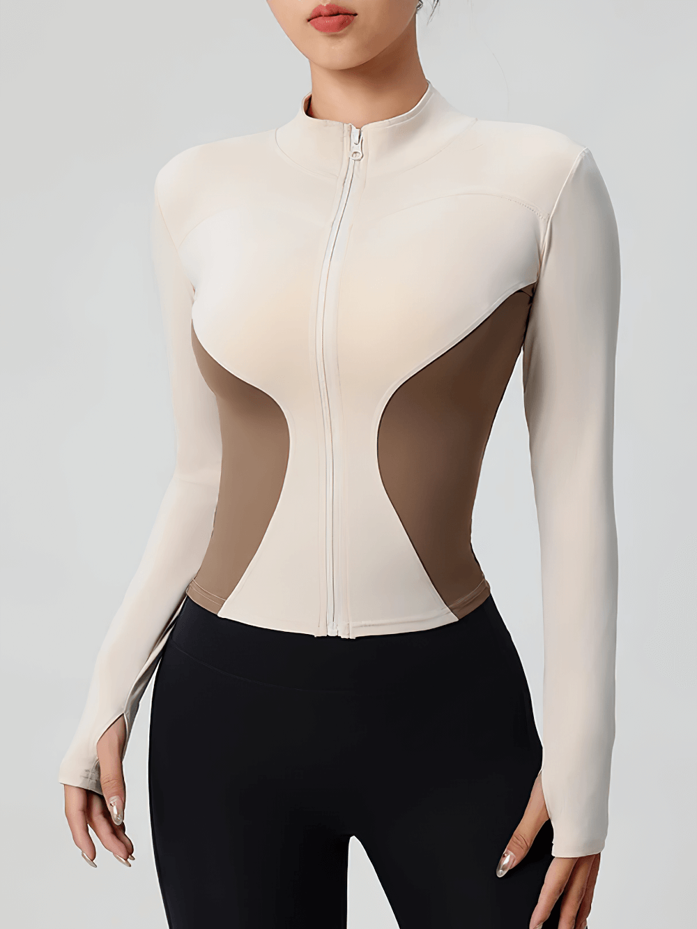 Woman wearing Women's Zip-Up Turtleneck Yoga Jacket with Thumbholes - SF4050, showcasing patch design panels and thumbhole sleeves.