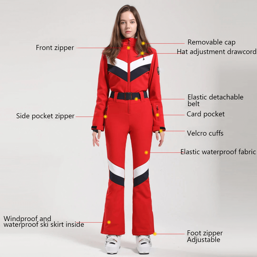 Women's red waterproof snowboard jumpsuit with buckle belt and zippers, perfect for comfort and style on the slopes.