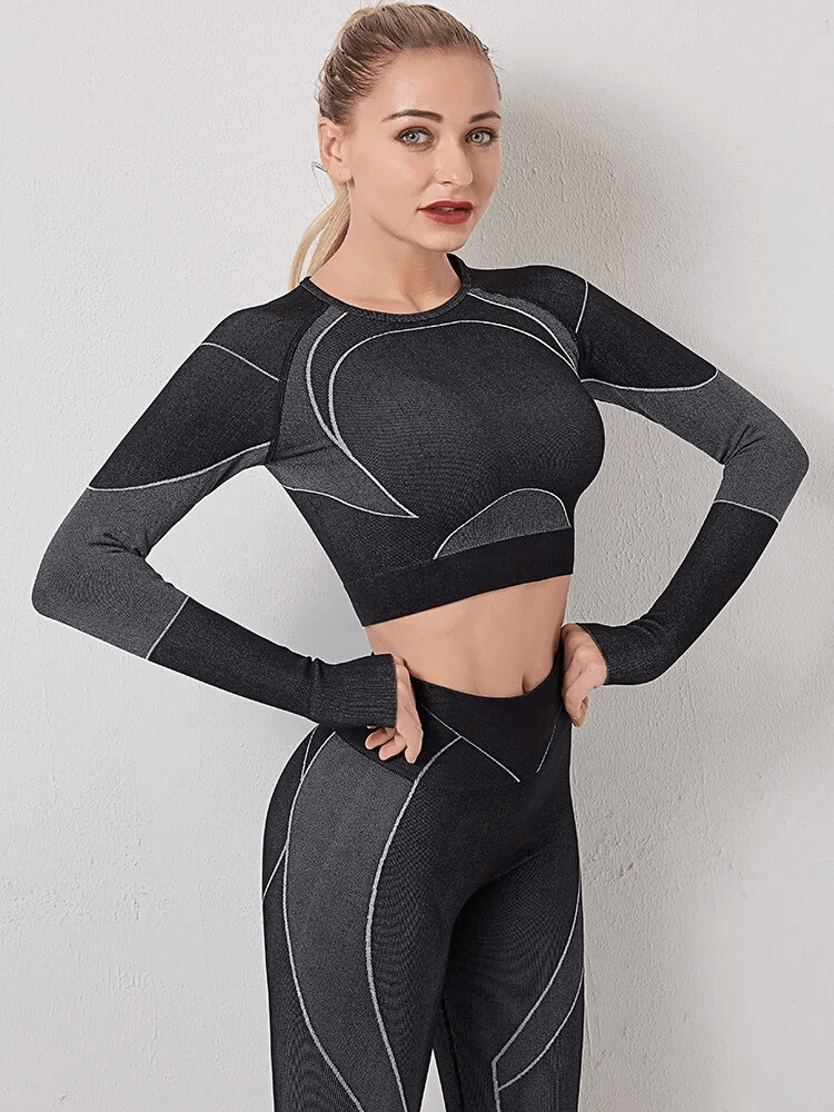 Woman wearing a black workout long sleeves suit with leggings, perfect for running and sports, made of breathable quick-dry material - SF1719