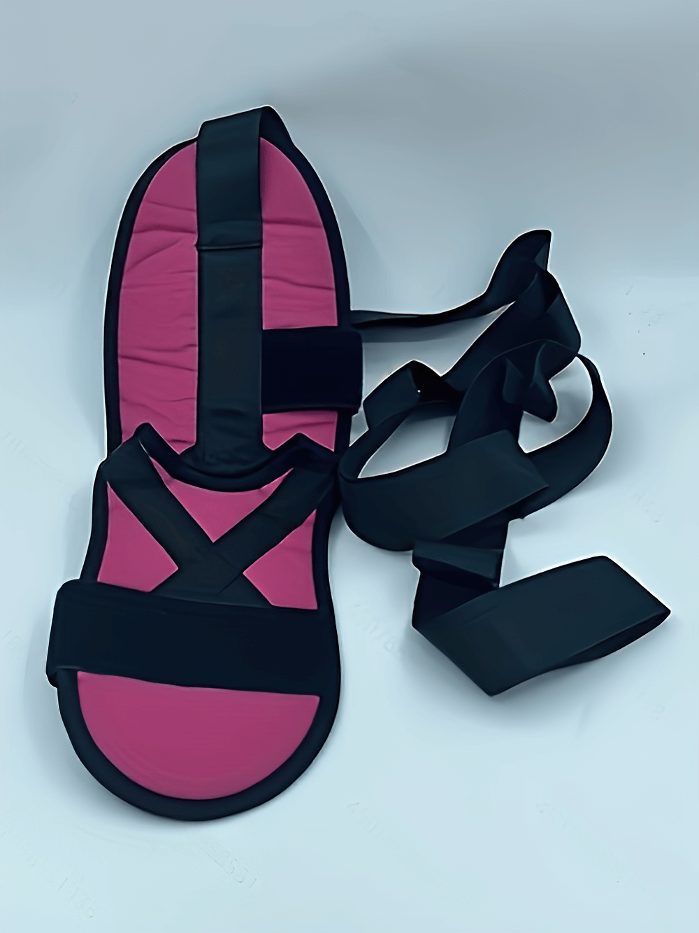 Yoga foot stretching strap in pink and black with multiple loops for flexibility and rehab training, ideal for Pilates and rehabilitation.