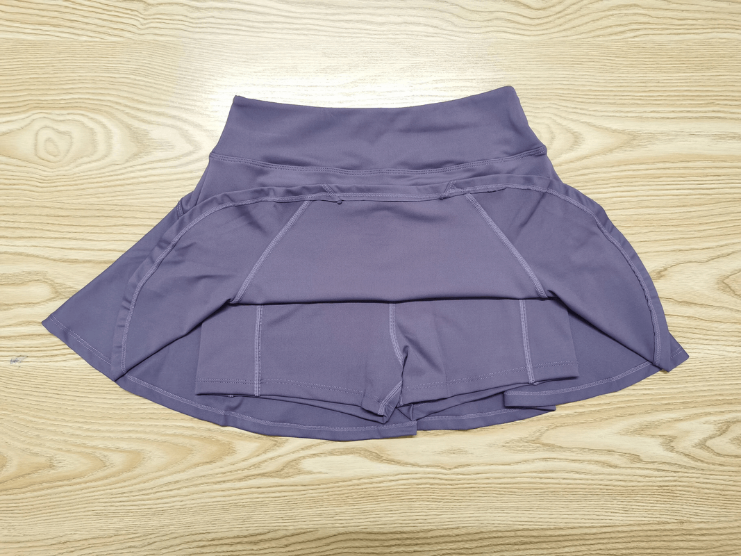 Purple elastic yoga gym skirt-shorts for running and badminton, breathable nylon, lightweight with comfort waistband. SF1749