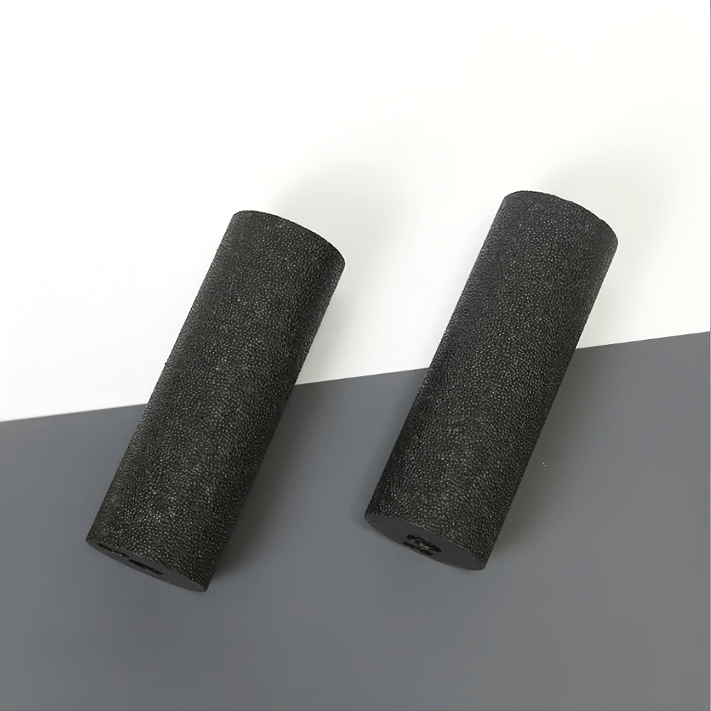 Two black EPP yoga rollers, perfect for portable muscle relaxation and fitness. Compact design for home or travel use.