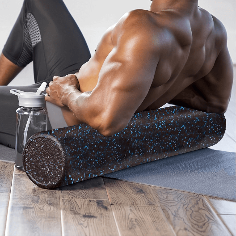 Man using EPP foam yoga roller for muscle relaxation and deep tissue massage, ideal for flexibility and recovery.