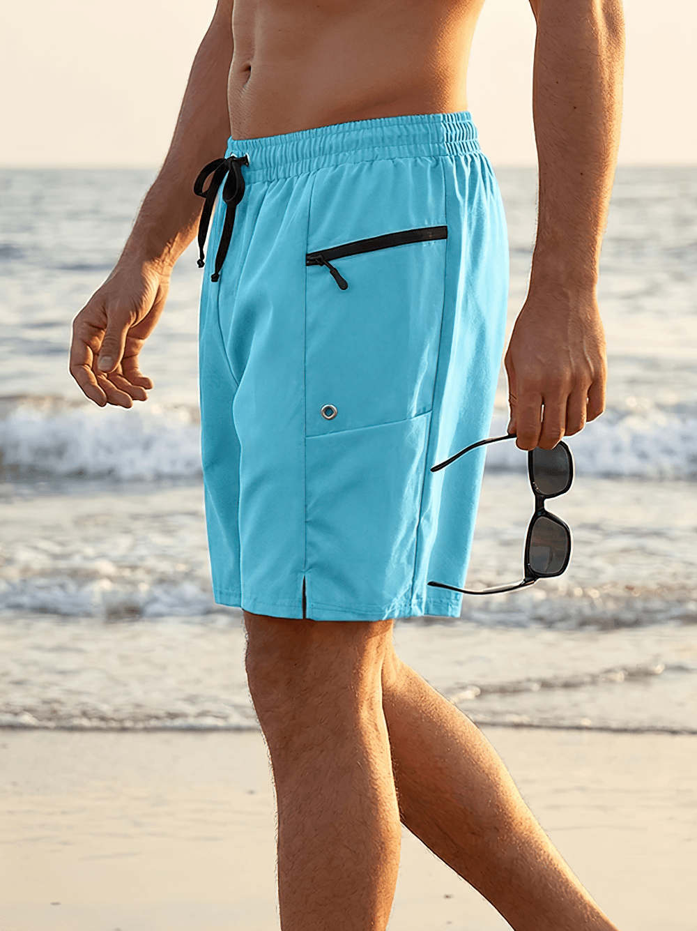 Alt Tag: Zip Pocket Swim Trunks with Drawstring Waist - SF4494 light blue board shorts with zipper pocket and drawstring on beach
