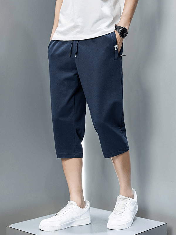 Casual men's breathable cotton breeches with zip pockets and spandex blend, perfect for outdoor activities, SF1323.