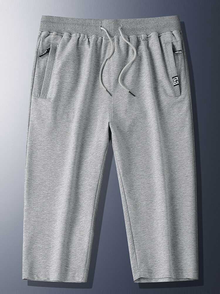 Gray breathable cotton breeches with zip pockets and drawstring, ideal for casual men's sportswear. SKU: SF1323