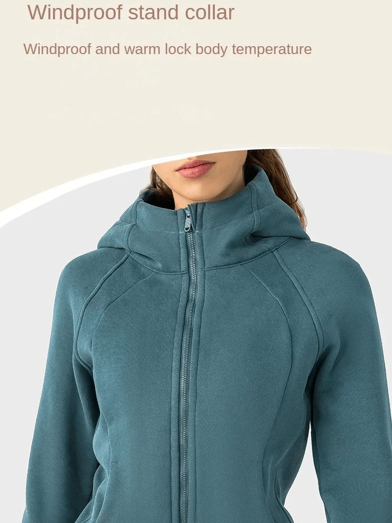 Women's teal zip-up athletic fleece hoodie with windproof stand collar for warmth and comfort, featuring full-length sleeves.