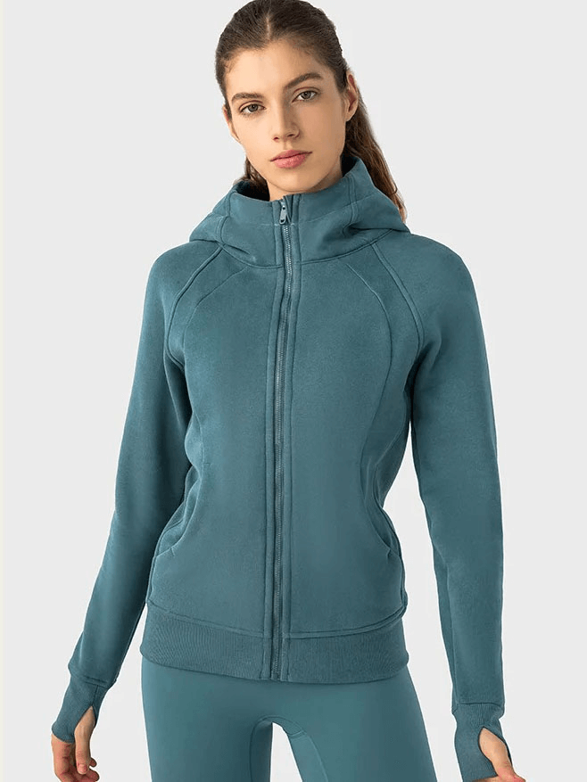 Woman wearing teal zip-up athletic fleece hoodie, full sleeves and stand collar, perfect for staying warm and active, product SF1919.