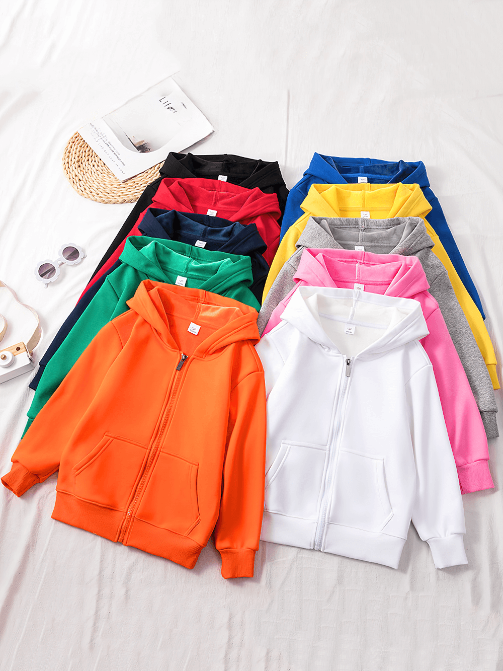 Vibrant kids' Zip Up Hoodie Sweatshirt with Kangaroo Pockets - SF3540 in 10 colors laid out for display.
