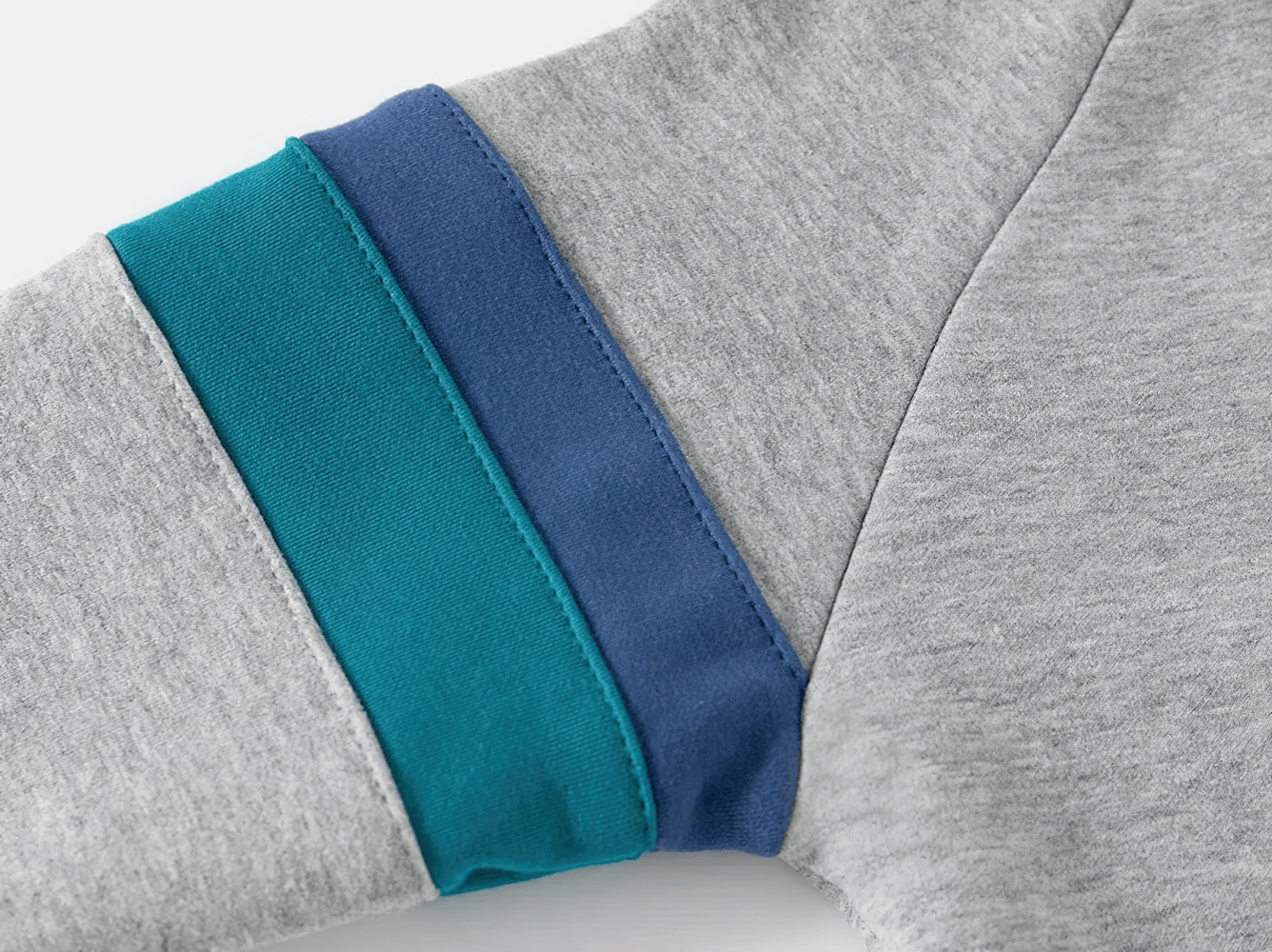 Close-up of sleeve design in Zip-Up Hoodie with Tractor and Car Designs - SF3657, showing colorful teal and navy stripes.